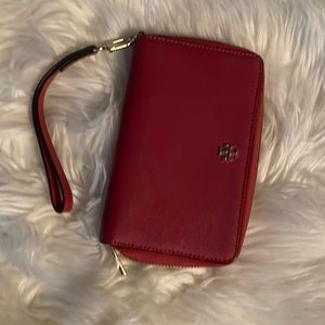 Tory Burch Zip around wallet Fuscia colored
